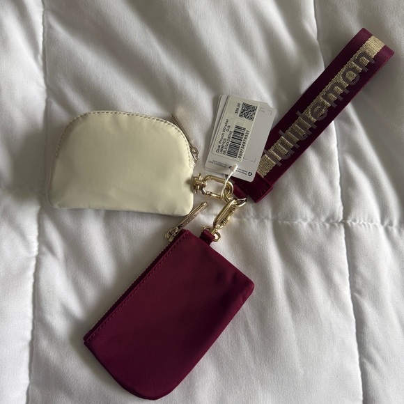 75&76 Lululemon Dual Pouch Wristlet Wordmark - Deep Luxe Gold Bone - Picture 6 of 7